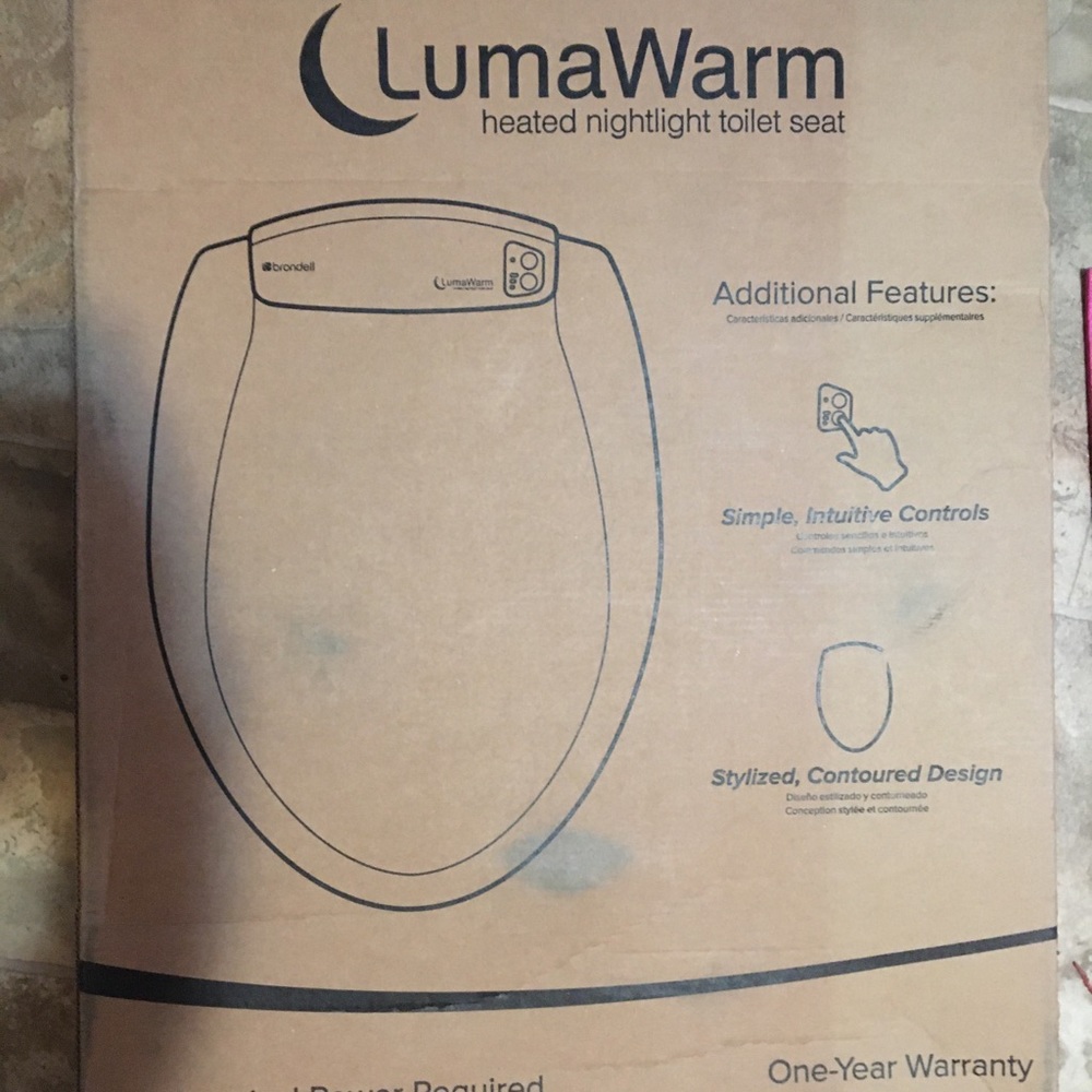 Lumawarm toilet seat new.